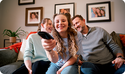 Image shows women interacting with a screen.