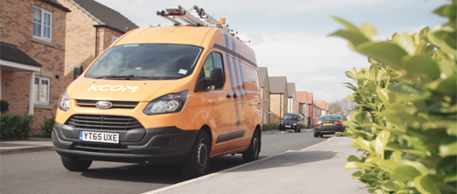 KCOM PRO team van parked in residential street.