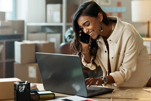 The scene depicts a customer completing a transaction by using a debit or credit card to make a payment for a service or product.