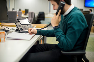 Man on phone at desk