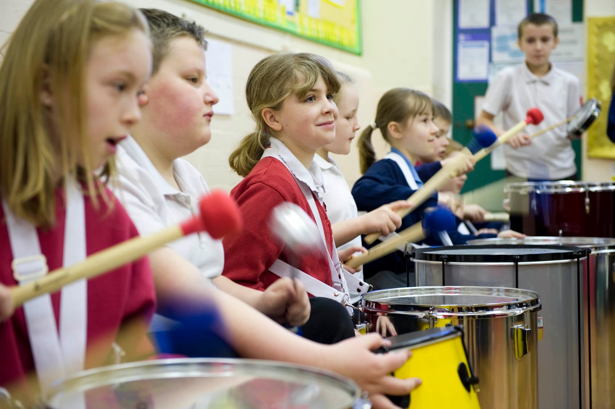 School children playing instruments