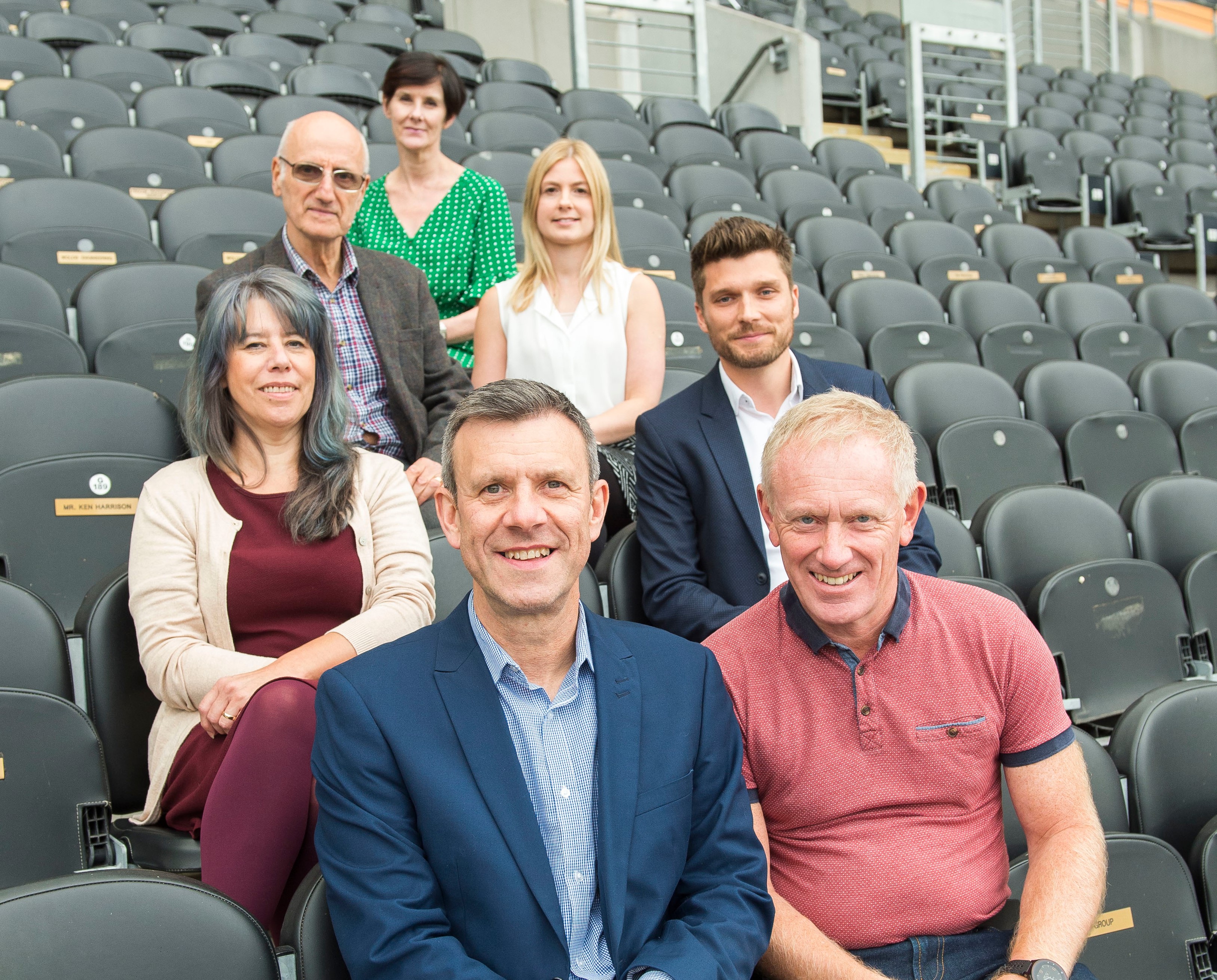 KCOM employees and local business people in the KCOM Stadium stands