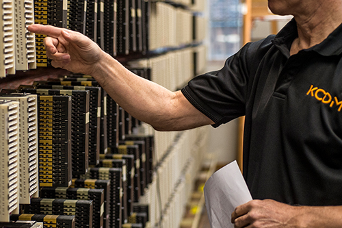 A KCOM engineer conducting a thorough inspection of the network to ensure its smooth operation and functionality.