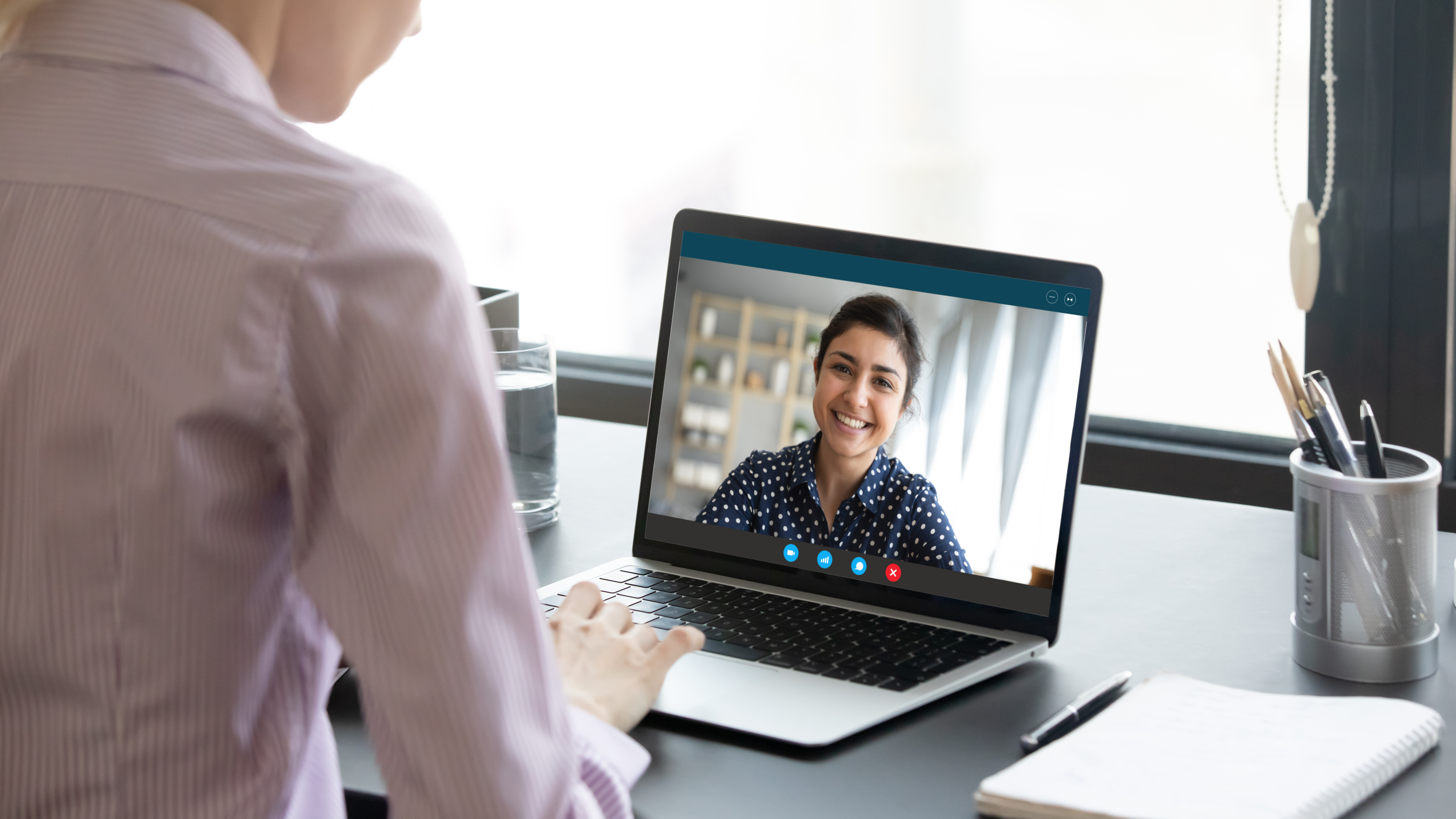 Video call interview on laptop