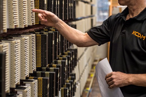 A KCOM engineer conducting a thorough inspection of the network to ensure its smooth operation and functionality.