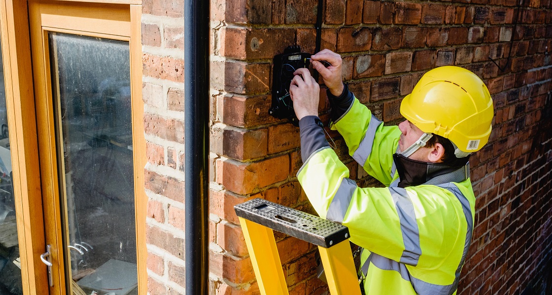 Engineer installing fibre