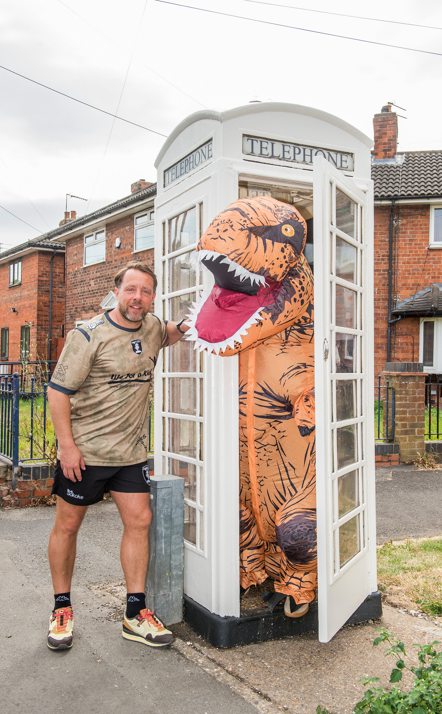 Dean and friend outside his K6 kiosk in east Hull