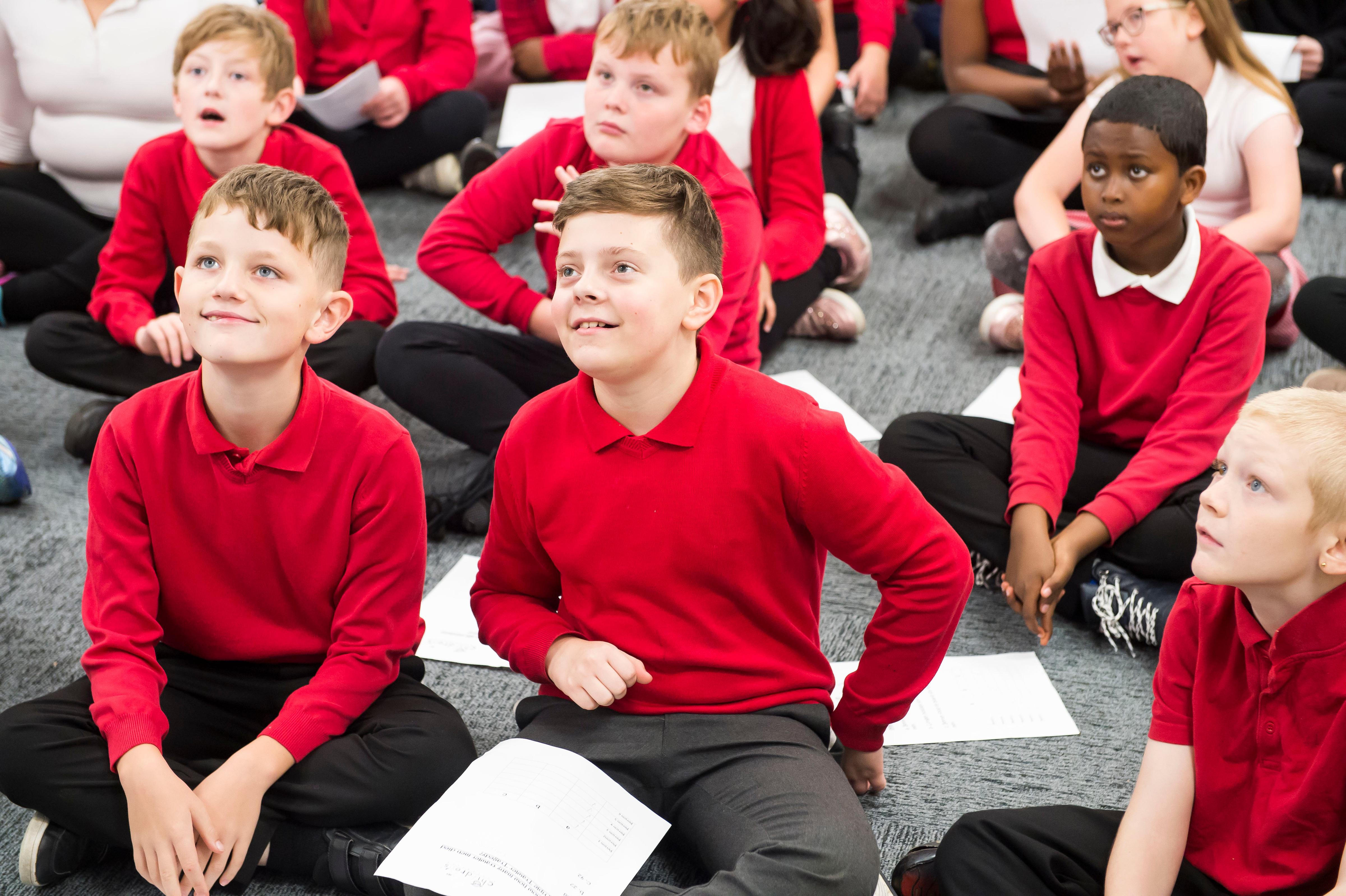 Children sat enjoying a KCOM experience day