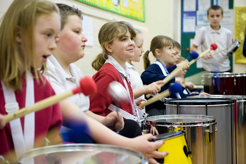 Children playing musical instruments