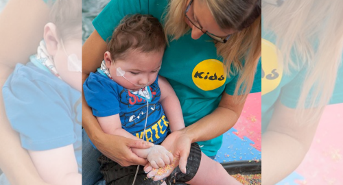 KIDS support worker with baby