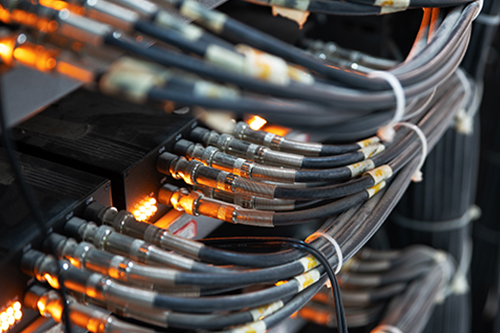  Network cables, intricately connected and extending to provide reliable internet access to valued customers, highlighting the seamless connectivity and service provided by the network infrastructure.