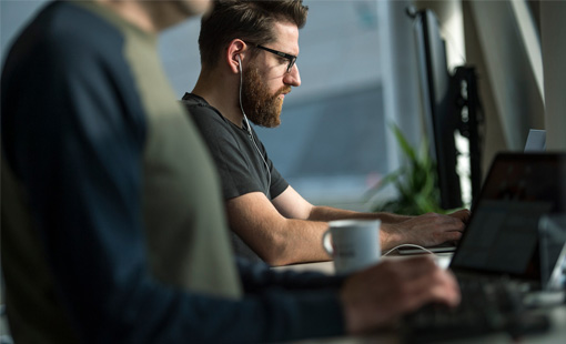 KCOM Systems employees working