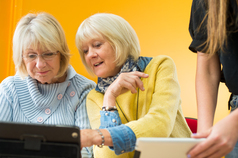 Older men using tablet