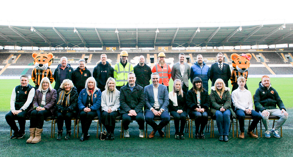 KCOM CEO Tim Shaw and MD Neil Bartholomew meet the Hull City team