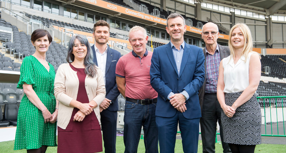 KCOM employees and local business people in the KCOM Stadium