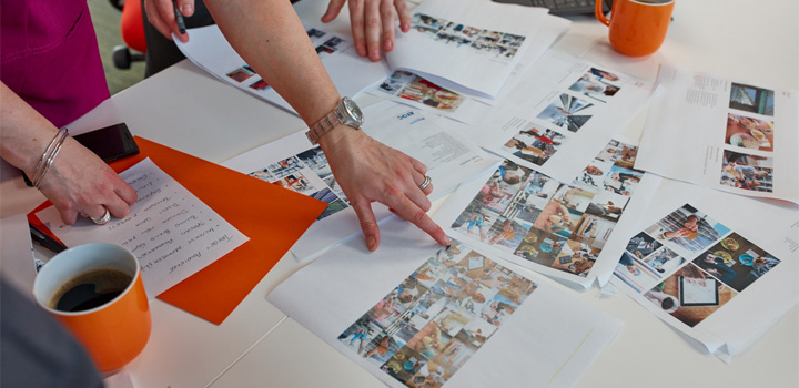 KCOM employees selecting grant applications