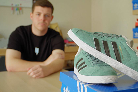Billy Gill with a pair of his sought-after custom trainers