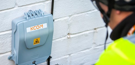 Image shows a KCOM engineer