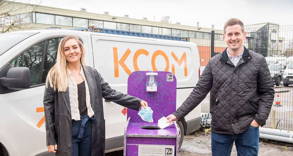 ReWorked's Izzie Glazzard and KCOM's Mark Blenkinsop with the PPE recycling bin