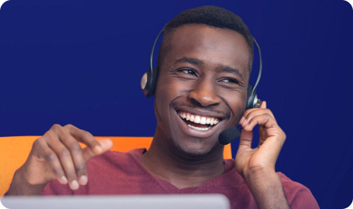 Image shows a man on a phone call.